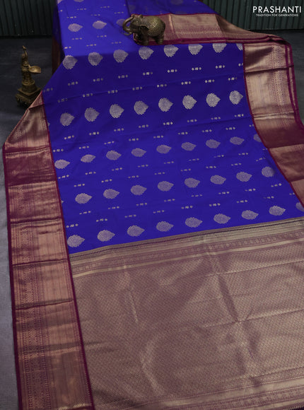 Semi kanchipuram silk saree blue and purple with allover zari woven buttas and long zari woven korvai border
