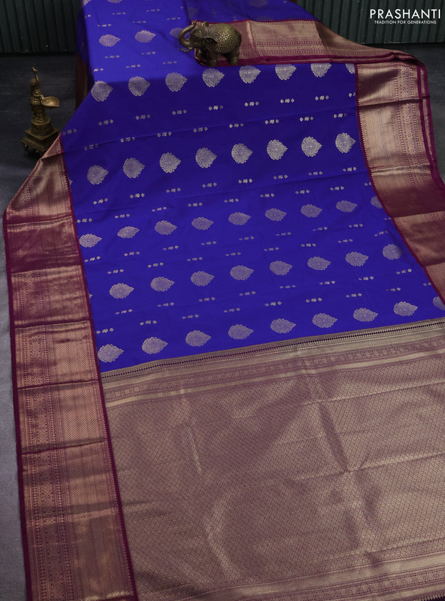 Semi kanchipuram silk saree blue and purple with allover zari woven buttas and long zari woven korvai border