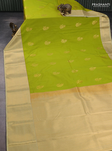Semi kanchipuram silk saree light green and cream with zari woven buttas and long zari woven korvai border