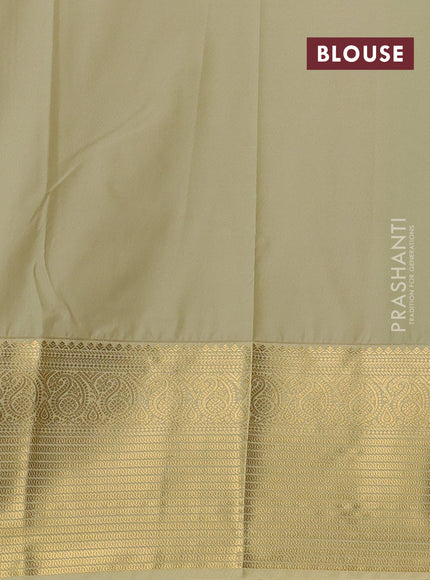 Semi kanchipuram silk saree light green and cream with zari woven buttas and long zari woven korvai border