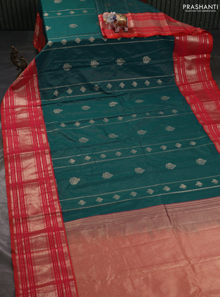 Semi kanchipuram silk saree peacock green and dual shade of pinkish orange with allover zari weaves & buttas and long zari woven korvai border