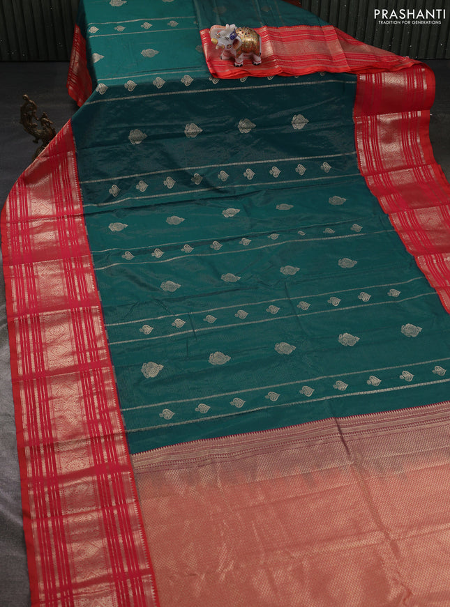 Semi kanchipuram silk saree peacock green and dual shade of pinkish orange with allover zari weaves & buttas and long zari woven korvai border