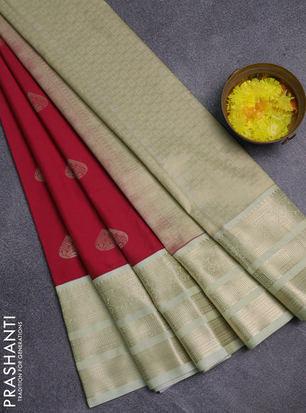 Semi kanchipuram silk saree tomato pink and pista green with zari woven buttas and long zari woven korvai border