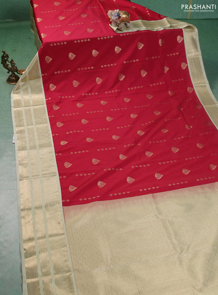 Semi kanchipuram silk saree tomato pink and pista green with zari woven buttas and long zari woven korvai border