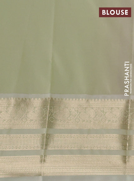 Semi kanchipuram silk saree tomato pink and pista green with zari woven buttas and long zari woven korvai border