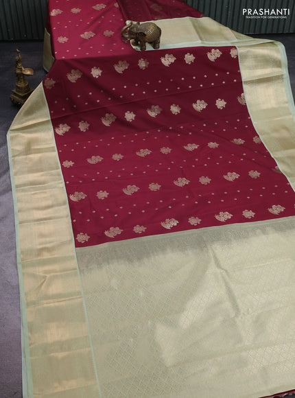 Semi kanchipuram silk saree wine shade and mild pista green with zari woven buttas and long zari woven korvai border