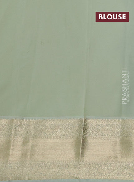 Semi kanchipuram silk saree wine shade and mild pista green with zari woven buttas and long zari woven korvai border