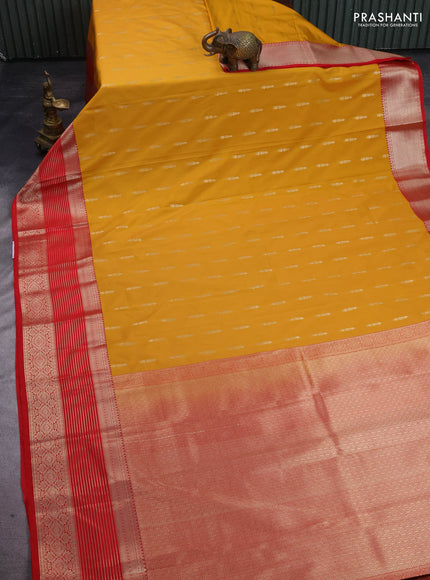 Semi kanchipuram silk saree mustard yellow and red with zari woven buttas and long zari woven korvai border