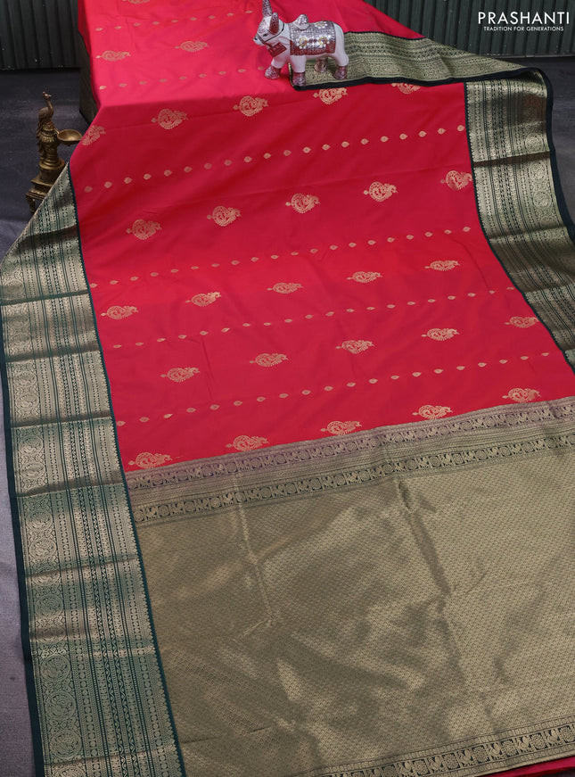 Semi kanchipuram silk saree pink and bottle green with zari woven buttas and long zari woven korvai border