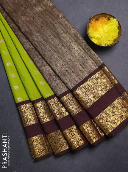 Semi kanchipuram silk saree light green and coffee brown with zari woven buttas and long rettapet zari woven korvai border
