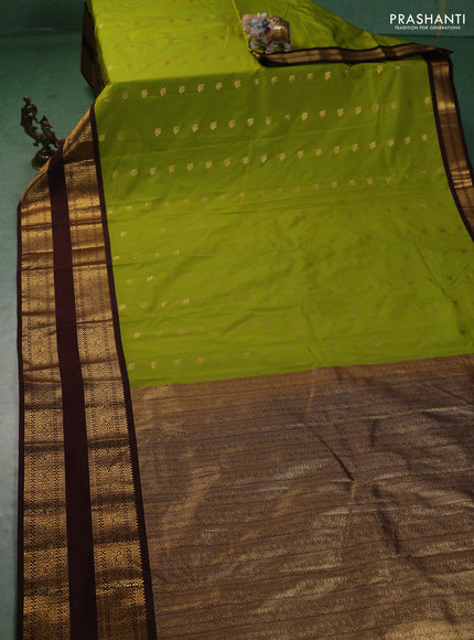 Semi kanchipuram silk saree light green and coffee brown with zari woven buttas and long rettapet zari woven korvai border
