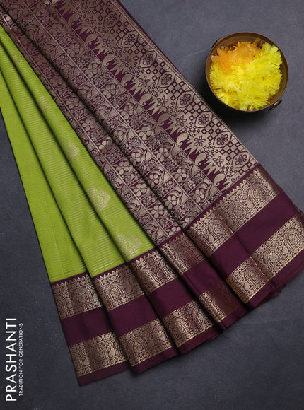 Semi kanchipuram silk saree light green and wine shade with allover zari weaves & buttas and rettapet zari woven border