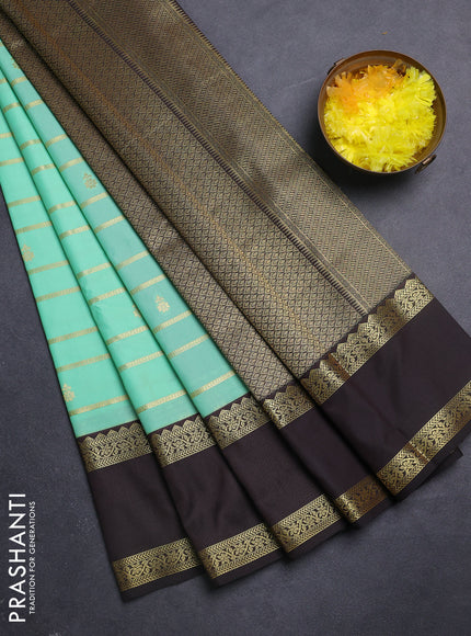 Semi kanchipuram silk saree teal green and deep coffee brown with allover zari weaves & buttas and rettapet zari woven border
