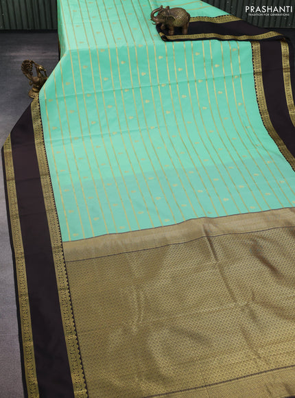 Semi kanchipuram silk saree teal green and deep coffee brown with allover zari weaves & buttas and rettapet zari woven border