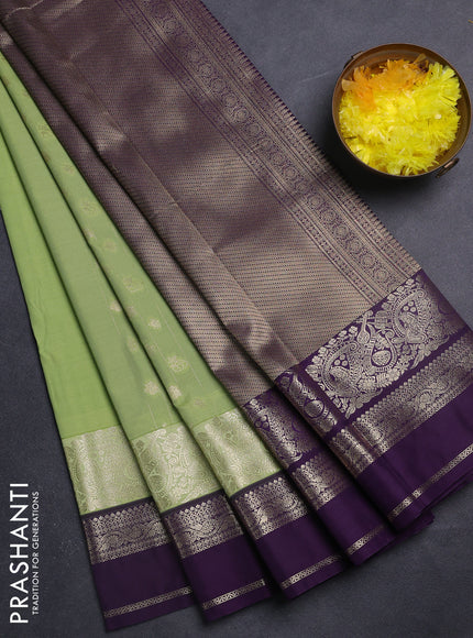 Semi kanchipuram silk saree pista green and violet with zari woven buttas and long zari woven border
