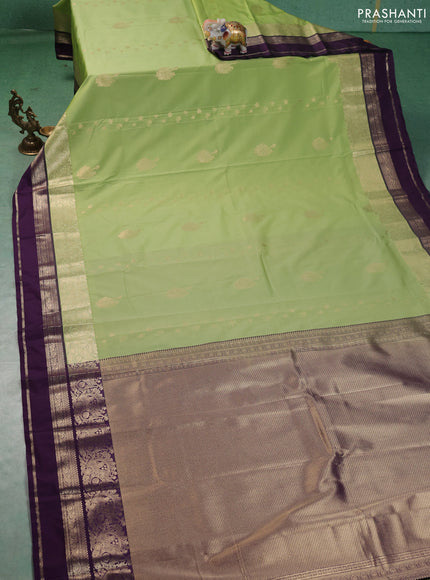 Semi kanchipuram silk saree pista green and violet with zari woven buttas and long zari woven border