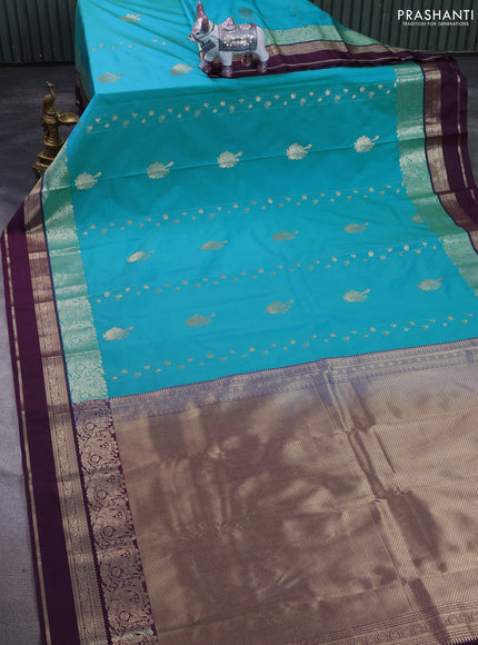 Semi kanchipuram silk saree blue shade and purple with zari woven buttas and long zari woven border