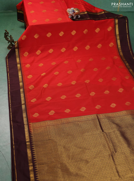 Semi kanchipuram silk saree orange and wine shade with zari woven buttas and temple design rettapet zari woven korvai border