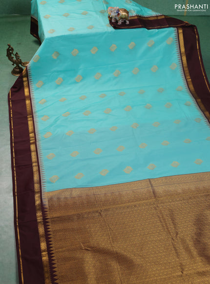 Semi kanchipuram silk saree teal blue and wine shade with zari woven buttas and temple design rettapet zari woven korvai border