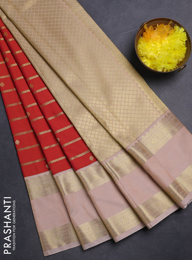 Semi kanchipuram silk saree dual shade of sunset orange and beige with allover zari stripe weaves & buttas and rettapet zari woven korvai border