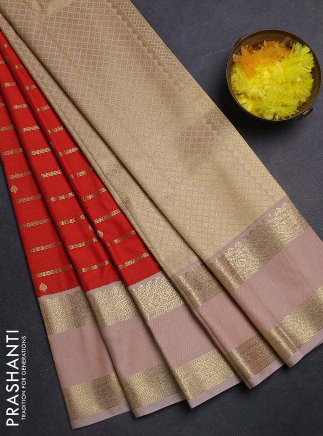 Semi kanchipuram silk saree orange and sandal with allover zari stripe weaves & buttas and rettapet zari woven korvai border