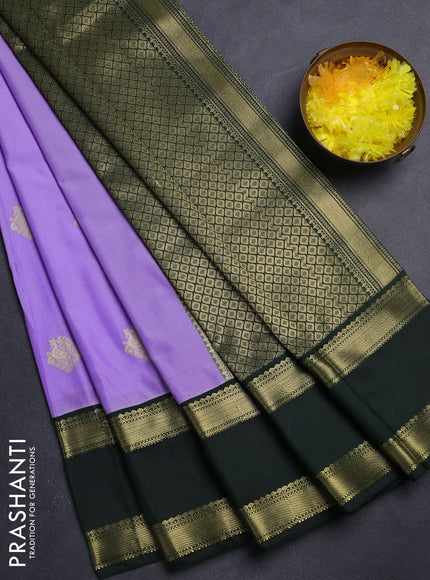 Semi kanchipuram silk saree lavender and bottle green with zari woven buttas and rettapet zari woven korvai border