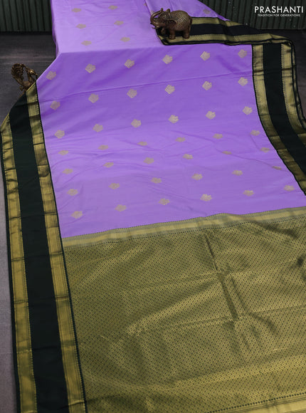 Semi kanchipuram silk saree lavender and bottle green with zari woven buttas and rettapet zari woven korvai border