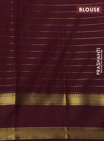 Semi kanchipuram silk saree dual shade of teal bluish green and coffee brown with allover zari stripe weaves and rettapet zari woven korvai border