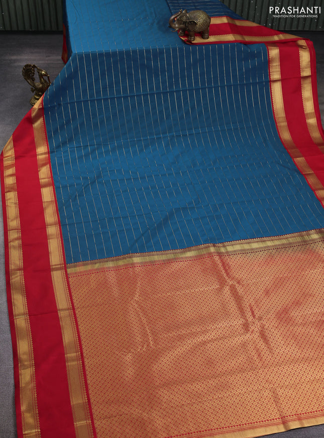 Semi kanchipuram silk saree peacock blue and red with allover zari stripe weaves and rettapet zari woven korvai border
