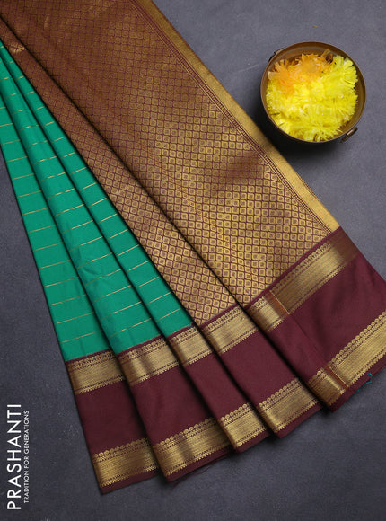 Semi kanchipuram silk saree green and coffee brown with allover zari stripe weaves and rettapet zari woven border
