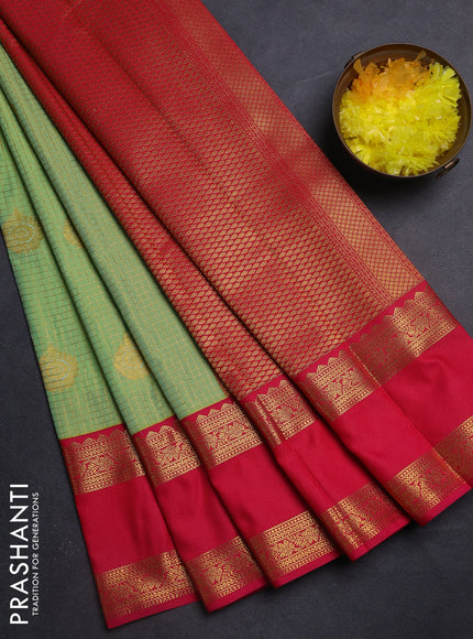 Semi kanchipuram silk saree pista green and pink with allover zari checks & buttas and rettapet zari woven korvai border