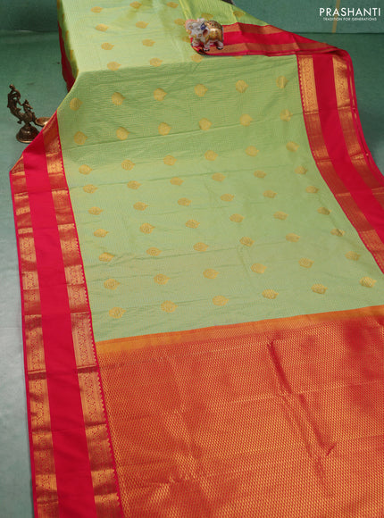Semi kanchipuram silk saree pista green and pink with allover zari checks & buttas and rettapet zari woven korvai border