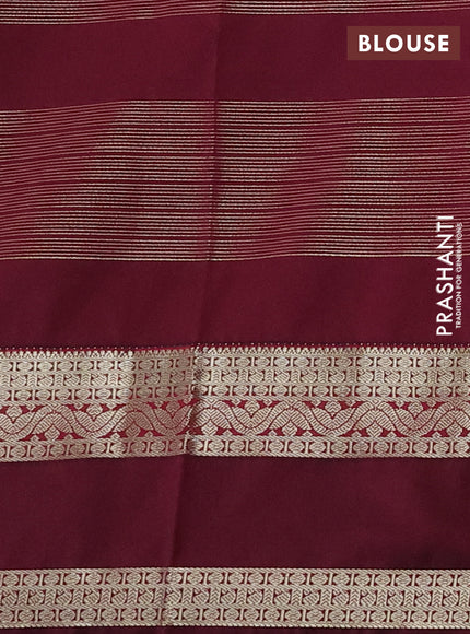 Semi kanchipuram silk saree cream and wine shade with allover zari weaves & buttas and rettapet zari woven korvai border