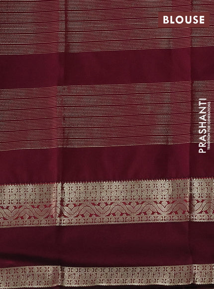 Semi kanchipuram silk saree teal green shade and wine shade with allover zari weaves & buttas and rettapet zari woven korvai border