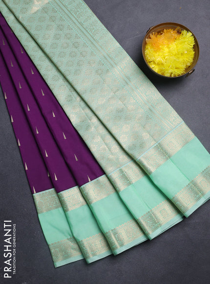 Semi kanchipuram silk saree purple and teal green shade with zari woven buttas and rettapet zari woven korvai border