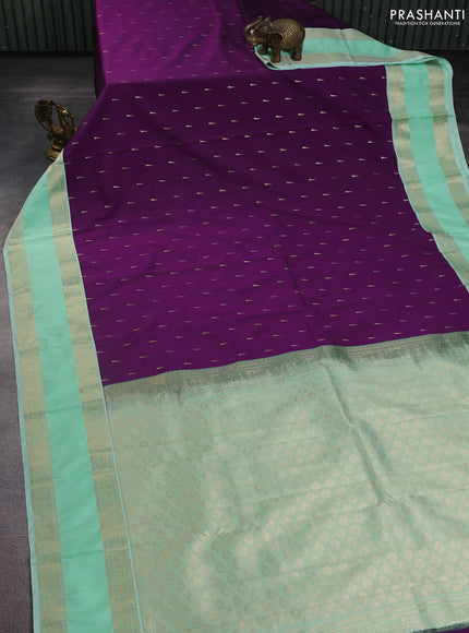Semi kanchipuram silk saree purple and teal green shade with zari woven buttas and rettapet zari woven korvai border