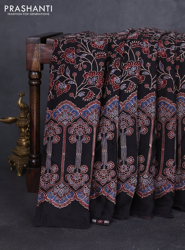 Modal silk saree black with allover ajrakh prints and printed border