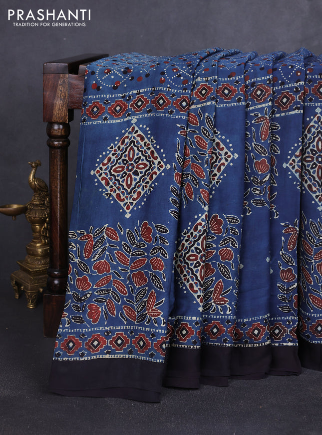 Modal silk saree blue and black with allover ajrakh prints and printed border