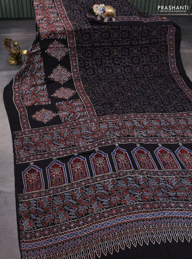 Modal silk saree black with allover ajrakh prints and printed border