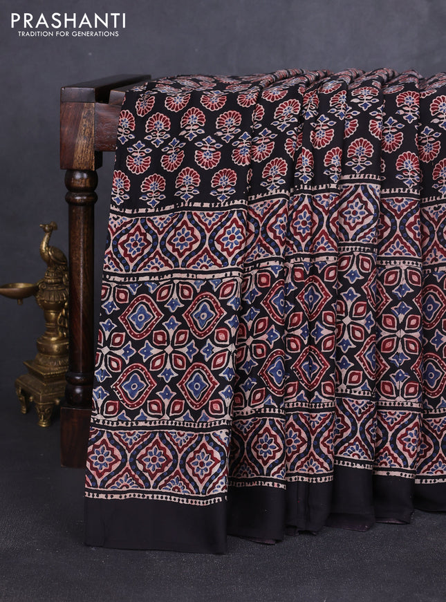 Modal silk saree black with allover ajrakh prints and printed border