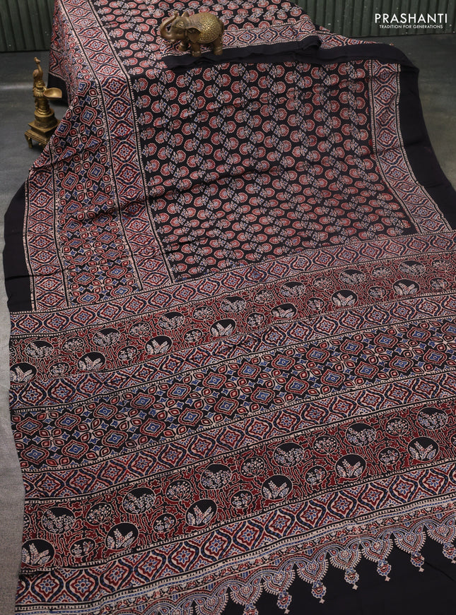 Modal silk saree black with allover ajrakh prints and printed border
