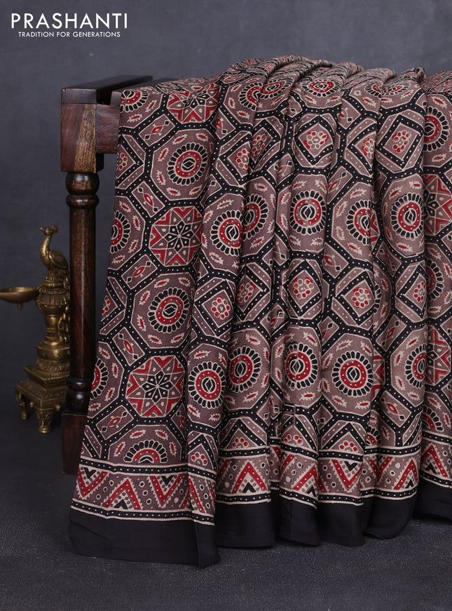 Modal silk saree pastel brown and black with allover ajrakh prints and printed border