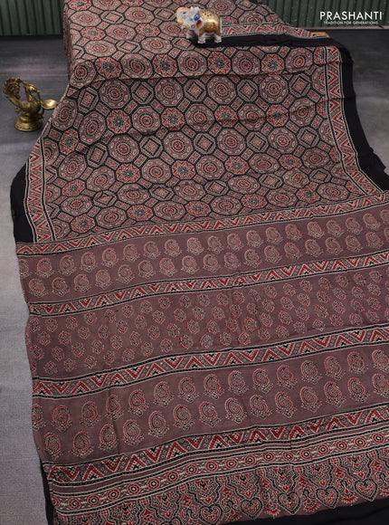 Modal silk saree pastel brown and black with allover ajrakh prints and printed border