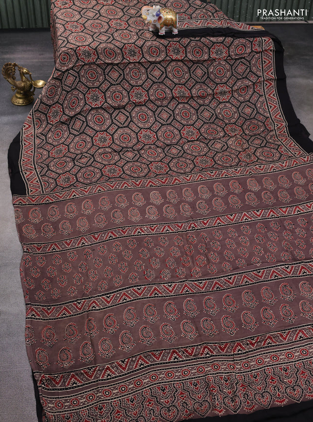 Modal silk saree pastel brown and black with allover ajrakh prints and printed border