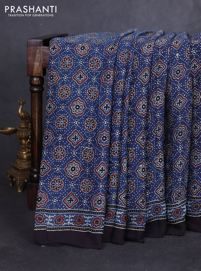 Modal silk saree blue and black with allover ajrakh prints and printed border