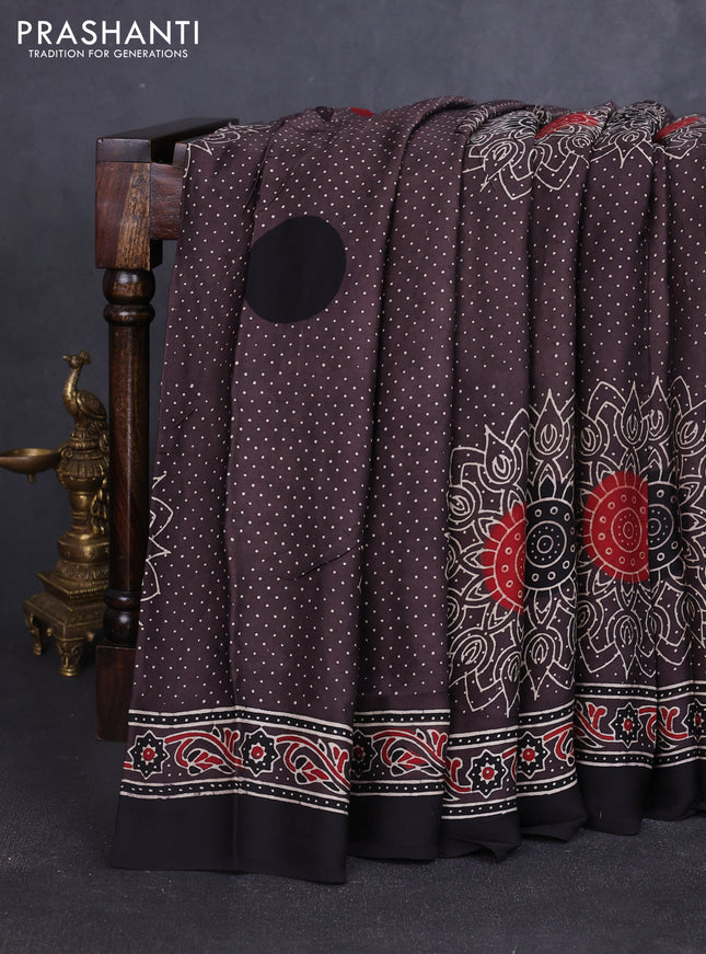 Modal silk saree brown and black with allover ajrakh prints and printed border