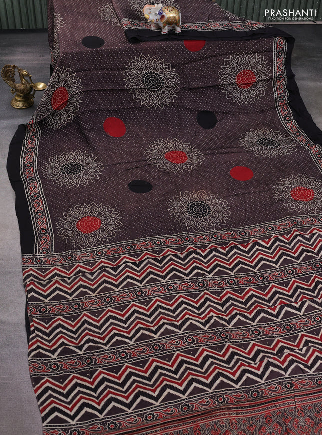 Modal silk saree brown and black with allover ajrakh prints and printed border