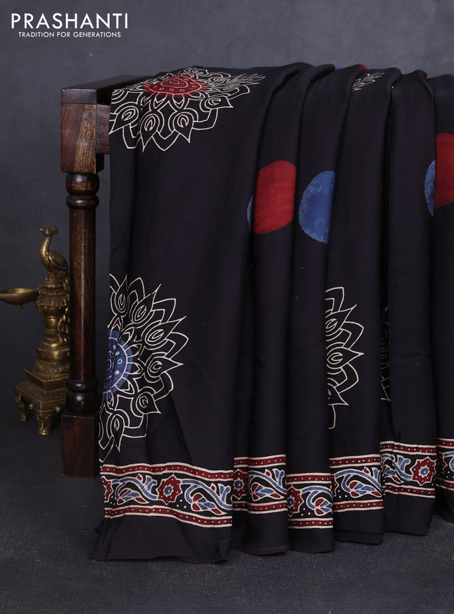 Modal silk saree black with allover ajrakh prints and printed border