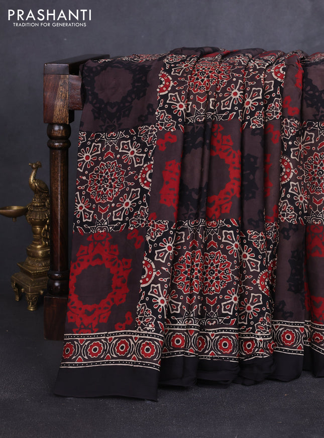 Modal silk saree black with allover ajrakh prints and printed border
