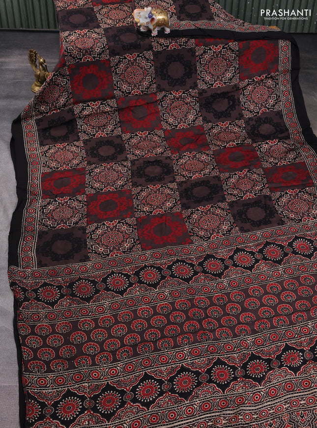Modal silk saree black with allover ajrakh prints and printed border